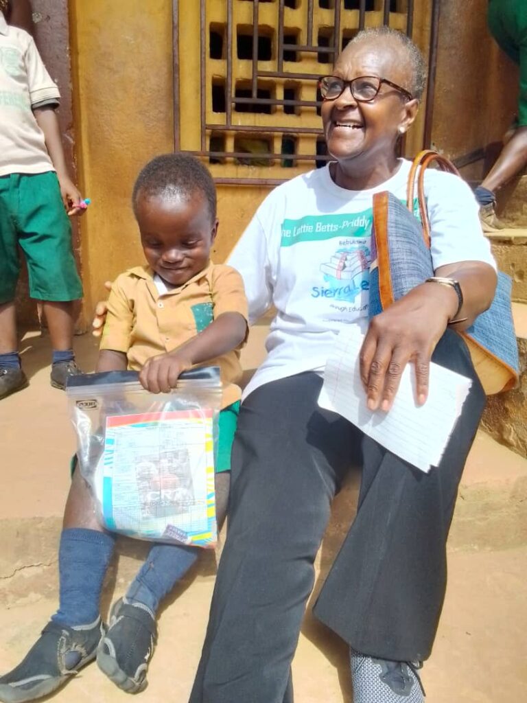 Isa with one of the youngest pupils